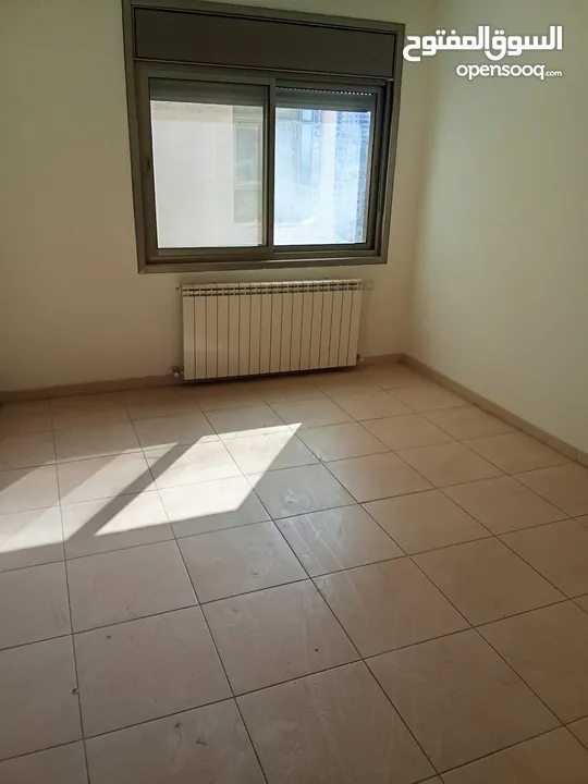 شقة للبيع عين منجد