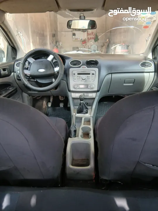 سيارة فورد فوكس صنع 2009 وستراد 2012 سيارة جيرعادي اصل اقتصادية بل بنزين فيها تامين وترخيص لشهر 9