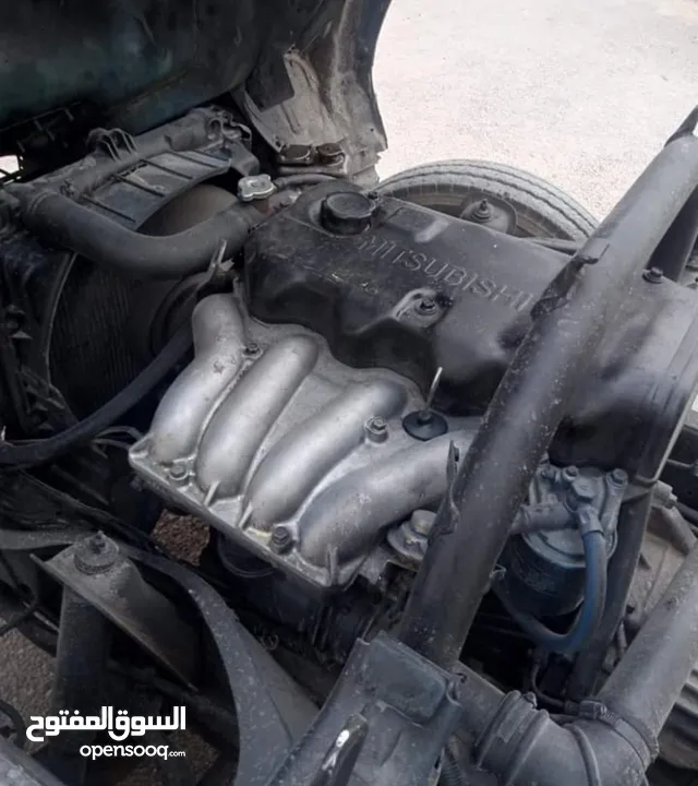 قلاب متسوبيشي كانتر مترين اصلي للبدل على قلاب عريض 2007