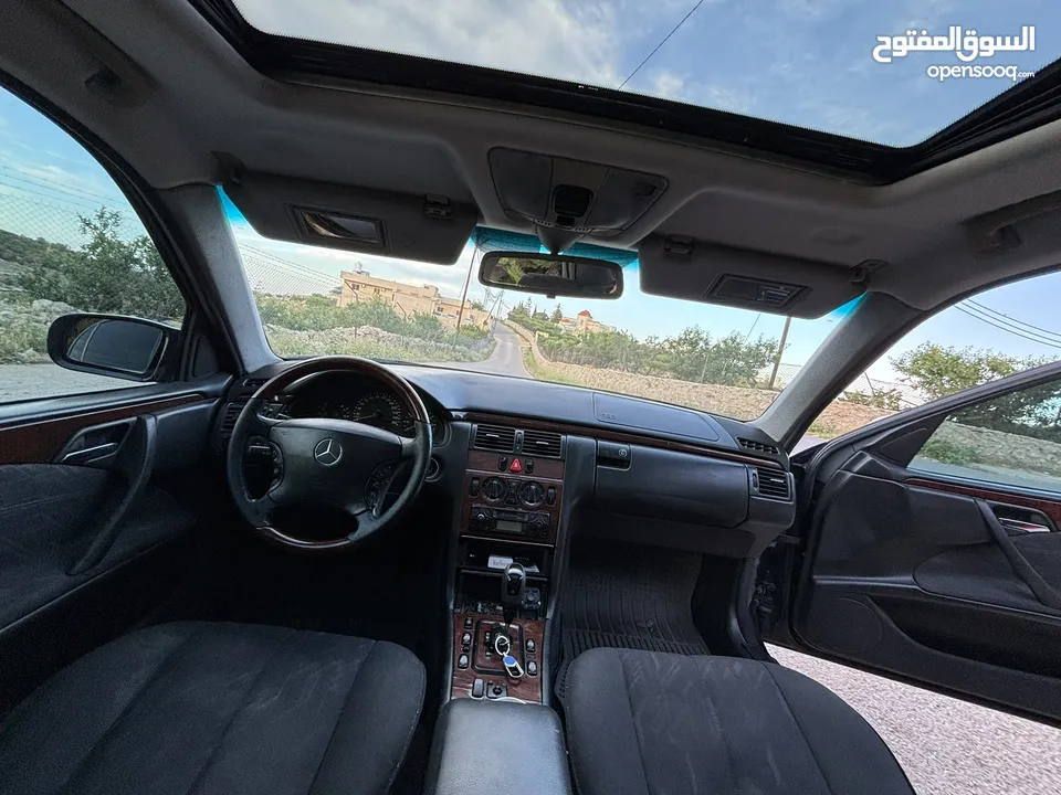 E200. 2002  قرش ونص 2002  رقم الهاتف بالوصف