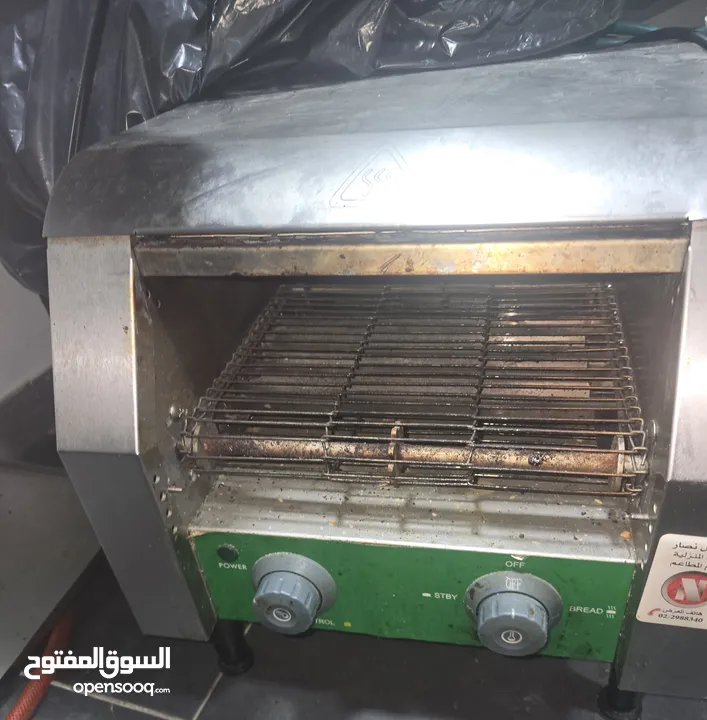 عدة مطعم برغر وبيتزا كاملا للبيع بسبب الاغلاق