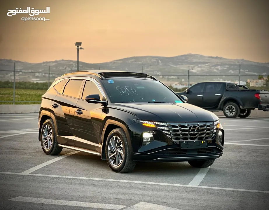 هونداي توسان/2022 فل الفل فتحة سقف بانوراما  2x4 ///240Hp بنزين + كهرباء  ( Haybrid) 1600cc