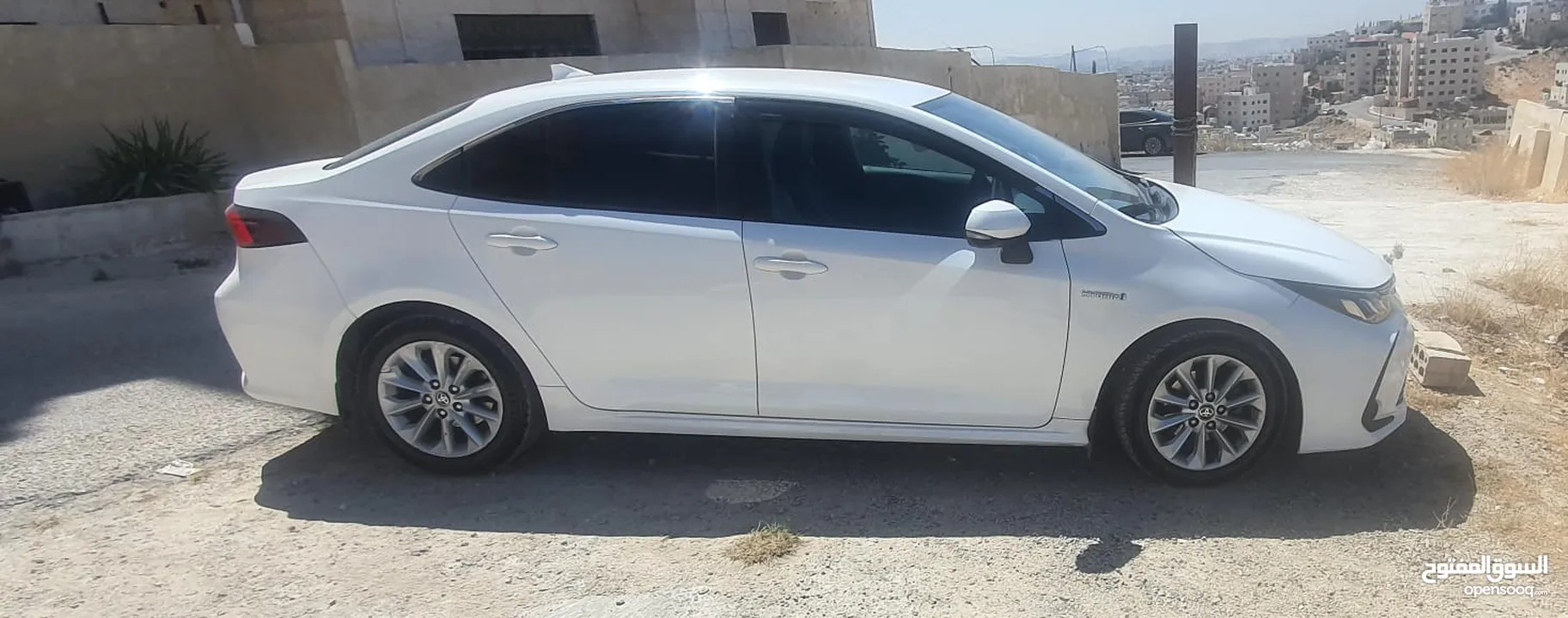 تويوتا كورولا 2021 هايبرد  للبيع مواصفات أوروبية سبعة جيد