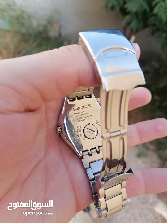 #SWATCH  سواتش سويسري اصلي لومينوس شباك للتاريخ  حجم 41 بحالة ممتازه  40 دينار