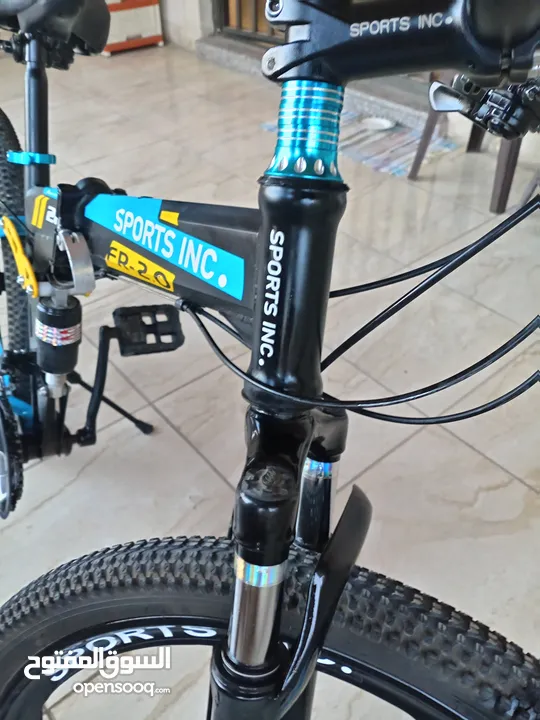 دراجة هوائية من نوع SPORTS INC من طراز SHIMANO جنط 26 باللون الأزرق اقرأ الوصف بدقة قابل للتفاوض