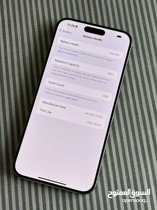 iPhone 15 bro Max natural titanium 256 GB used like a new
