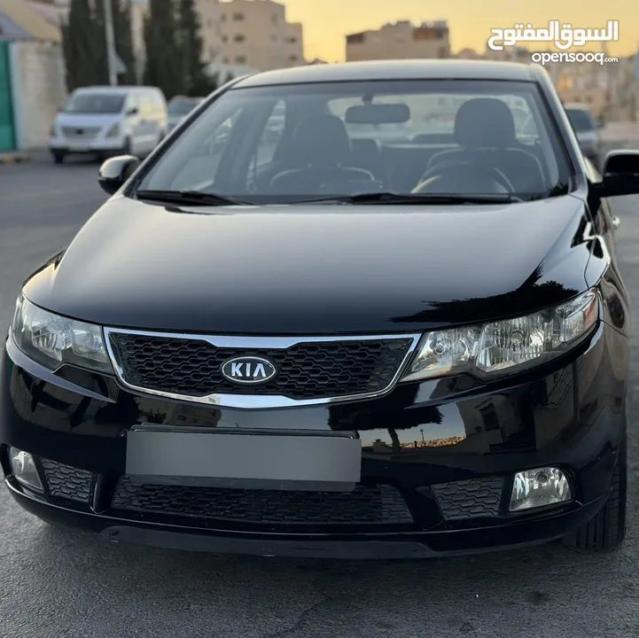 كيا فورتي للبيع بحالة ممتازه  Kia Forte 2013 لون اسود فحص كامل