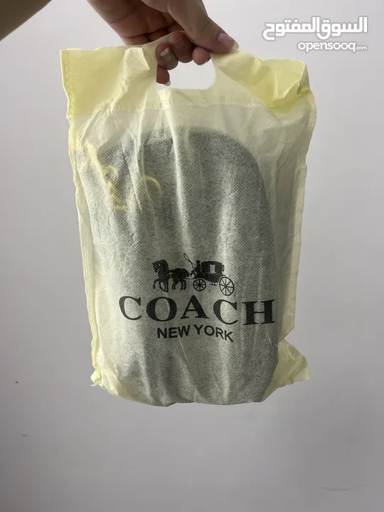 شنتة coach first copy  جلد باللون الأسود  للبيع