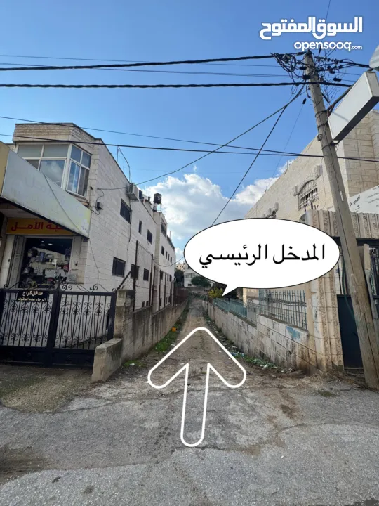 ارض للبيع في ام الشرايط بالقرب من الشارع الرئيسي