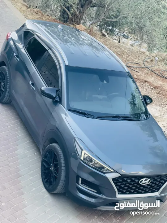 توسان 2020ترخيص19يد اولى فحص نخب سعر حرق حرق لون مميز بصمة مفتاحين شركة