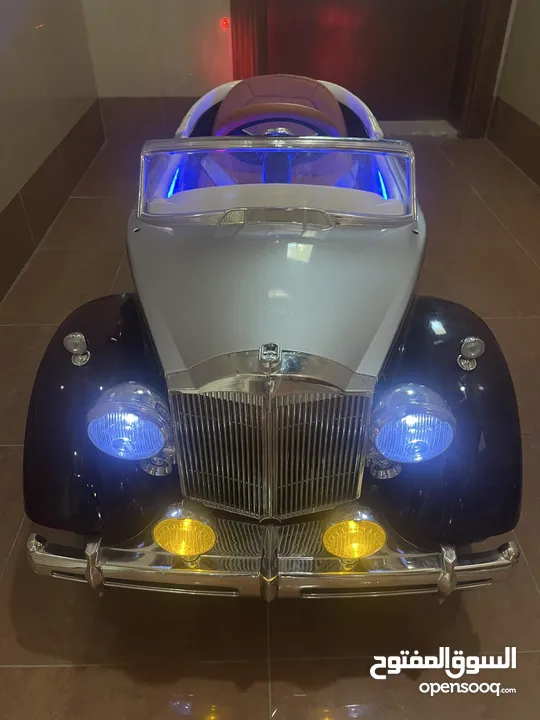 سيارة أطفال كهربائية مضاءة بالكامل وسماعات ‏ Children's electric car with lights and sound