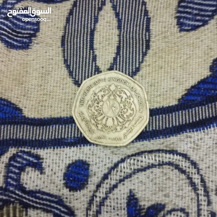 نصف دينار أردني نادر بشكل ربع دينار – تحفة نادرة لهواة العملات الأردنية ................