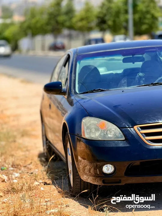 نيسان التما بنزين ماتور 2500 لون اسود
