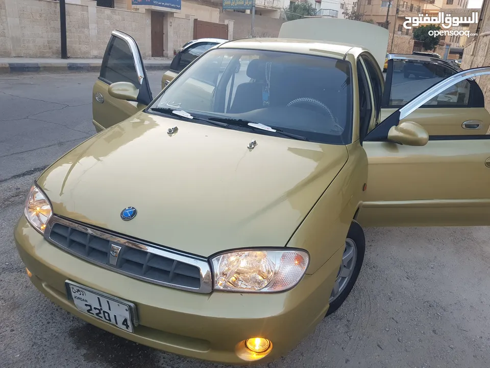 كيا سبكتر توماتيك اقساط دفعة 1200 دهان جديد  ماتور جديد  قير جيد  فحص مرفق  مكانيك سيارة مشية ناعمة