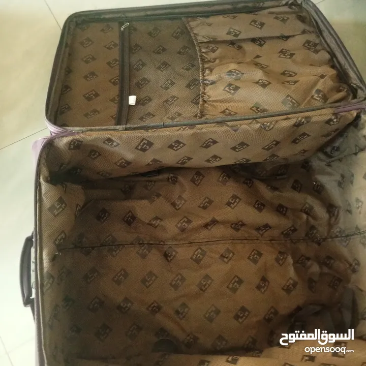 شنتة سفر جر لون بنفسجي غامق حجم كبير