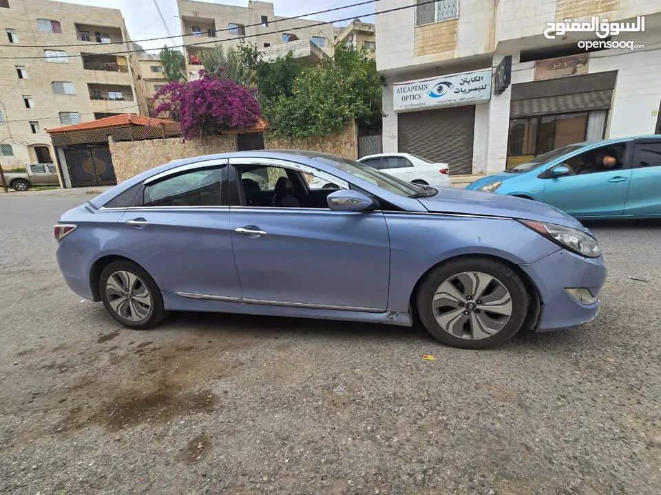 سوناتا هايبرد 2014 وأريد امريكي فل ليميتد إضافات ماتور 2400