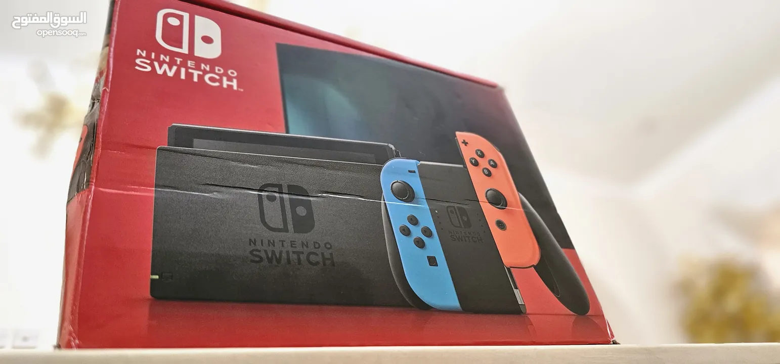 Nintendo SwitchTM - Neon Blue + Neon Red Joy-Con Worldwide Shipping Available Separate Charge