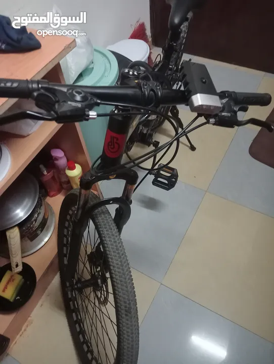 folding bike and Chromebook laptop