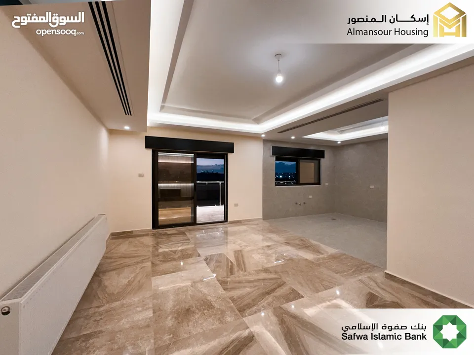شقة ارضي معلق 190م2 يسار فاخرة للبيع في منطقة مكة مول/ مشروع مكة مول 5 (1/2) ( إسكان المنصور )