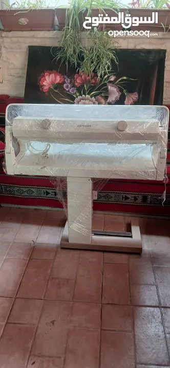 مكوى برادي يعمل عاي الكهرباء