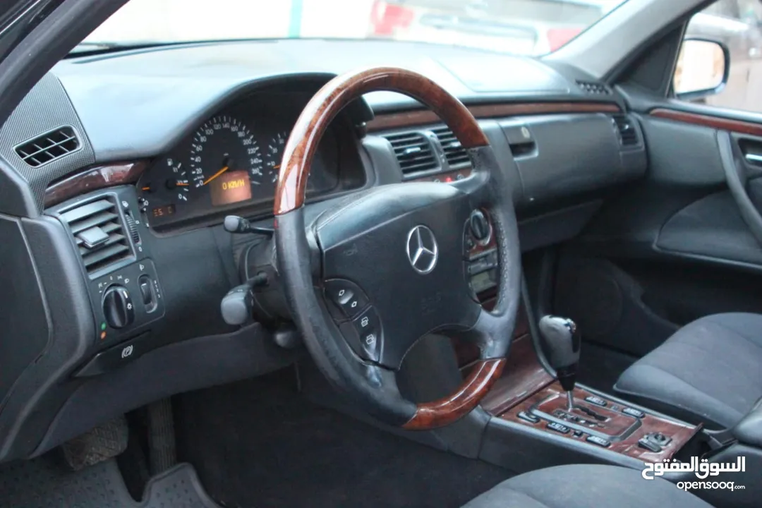 E200. 2002  قرش ونص 2002  رقم الهاتف بالوصف
