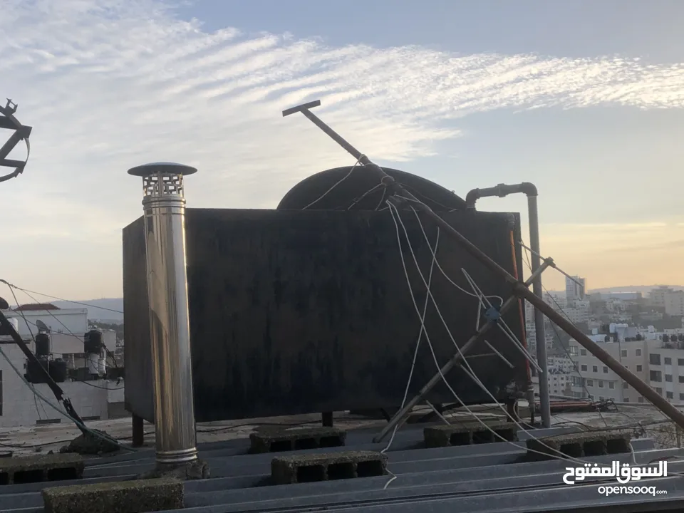 ماطور تدفئة مركزية مع خزان سولار مع الراديترات (المشعاعات)