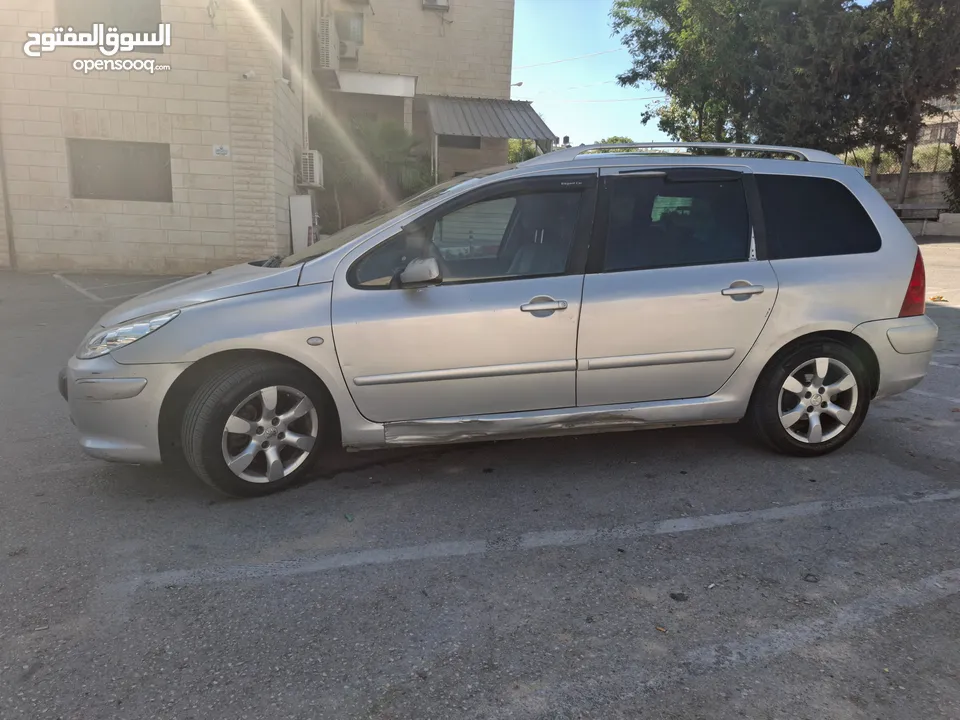 بيجو 307 sw [ستيشن]