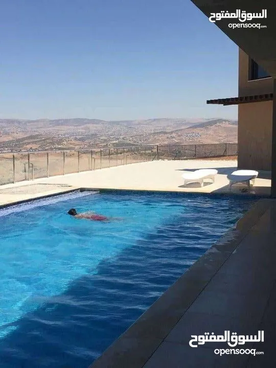شاليه حديث للبيع جرش جبة المصطبة مطلة على السد مع مسبح