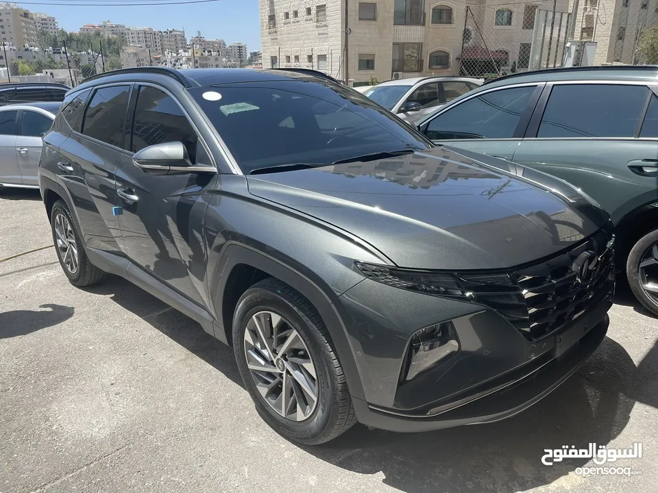 توسان هايبرد 2023 عداد 12 الف فقط فل الفل مخنوق اضافات جيب دفعتك وشيكاتك وروح فيه