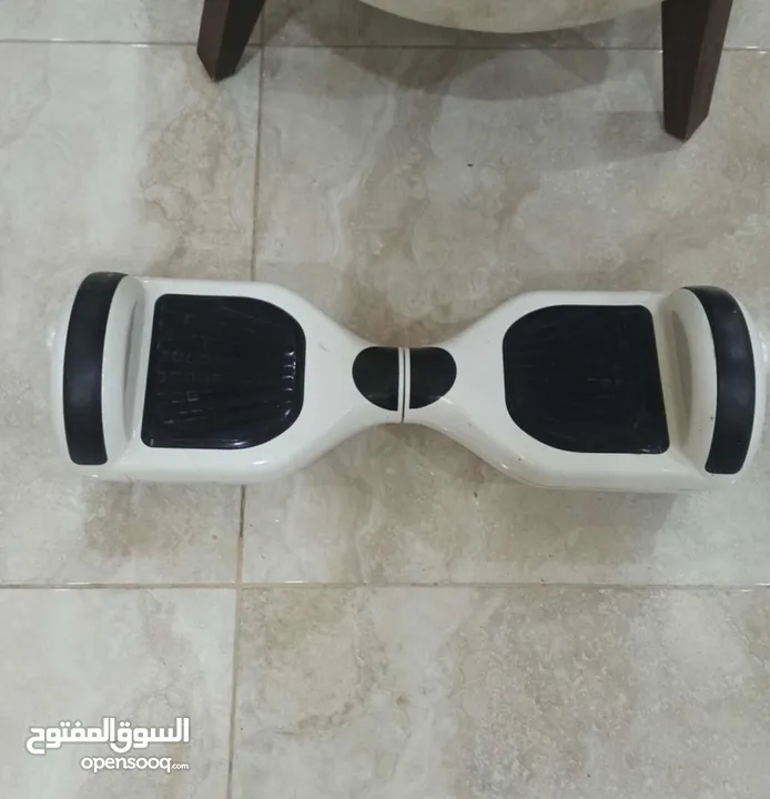 Hoverboard مع شاحن موجود شبه جديد