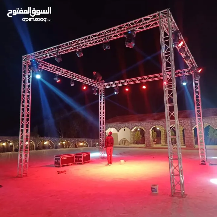 اجهزة اضاءة متحركة للمحلات والمناسبات تراس اضاءة موفينج هيد بيمات باركانات سماعات دي جي اقواس بلالين