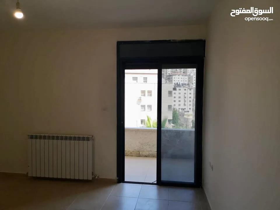شقة للبيع في عين منجد رام الله مطلة على جبل المصيون مشرفة على منظر جميل مرتفع في مدينة رام الله