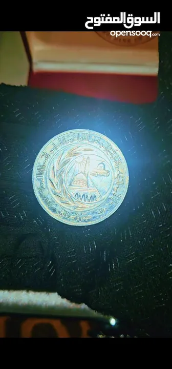 عملة فضة بوزن اونصه