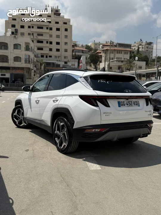 هونداي توسان ترخيص 2022 محرك 1600 هايبرد plug in/يقطع على الشحنه 52 كيلو متر