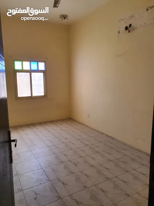 Apartments for in muharraq two rooms two bathrooms and kitchen