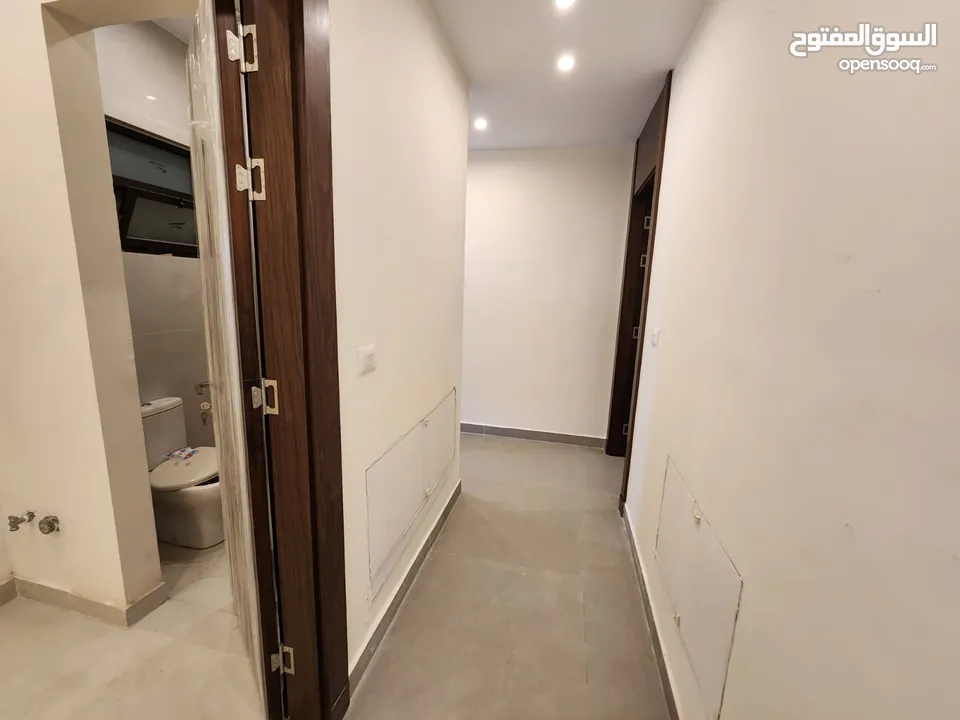 شقة طابقية فاخرة للبيع في عبدون  ref : 14383