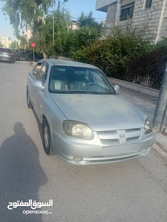 هونداي فيرنا لون سلفر موديل 2004 مرخصة  فحص 4 جيد للبيع بشكل مستعجل