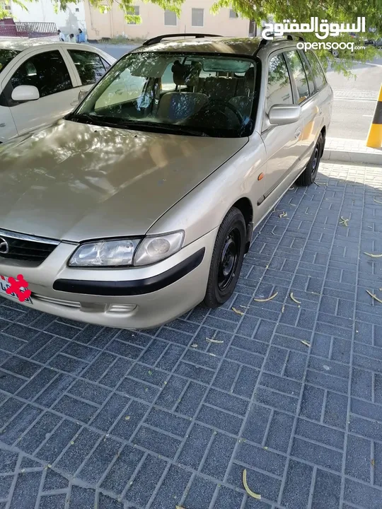 A 2001 Mazda car for sale in very good condition. Delivery once ownership is transferred for travel