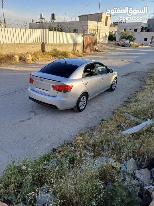 دفعه كيا فورتي 2009 ماتور1600 بنزين جير اوتماتيك حساسات خلفي مكيف شغال شبابيك كهر