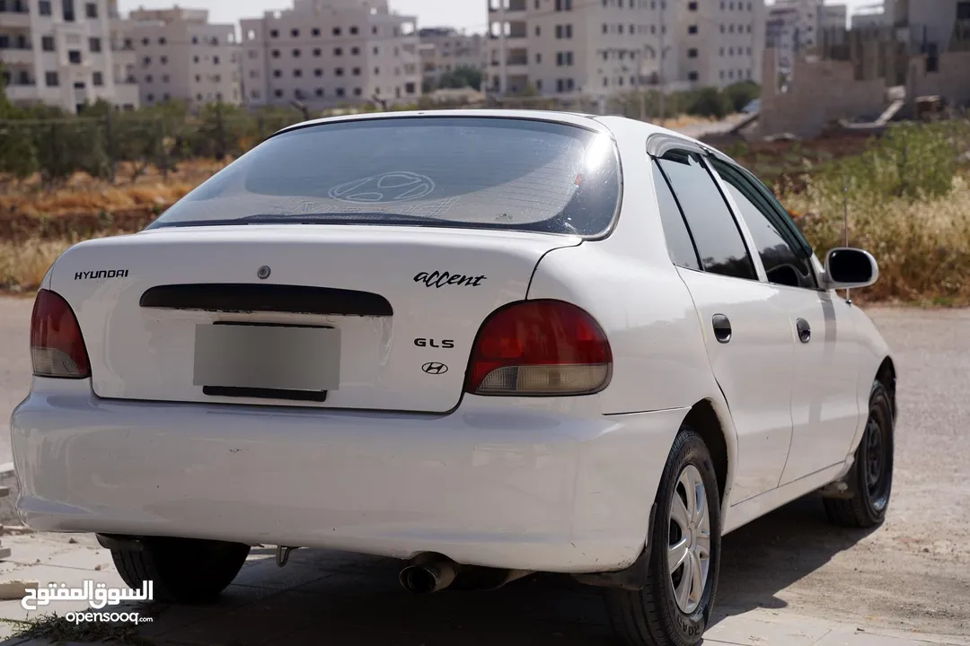 هونداي اكسنت هاتشباغ موديل 1998 لون ابيض   بسعر مغري و مميز جدددددا