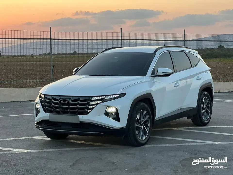 هونداي توسان/2022 فل الفل بدون فتحة سقف  2x4 ///240Hp بنزين + كهرباء  ( Haybrid) 1600cc