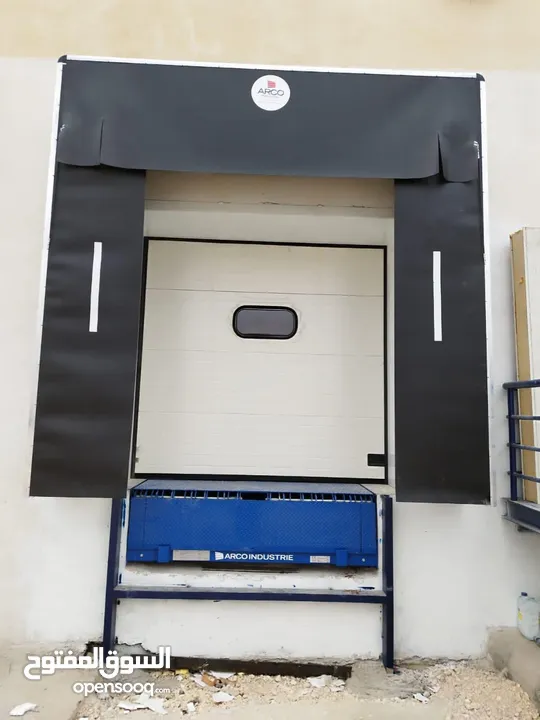 Dock levelers , rapid doors , industrial and residential sectional doors , shelters and cold doors