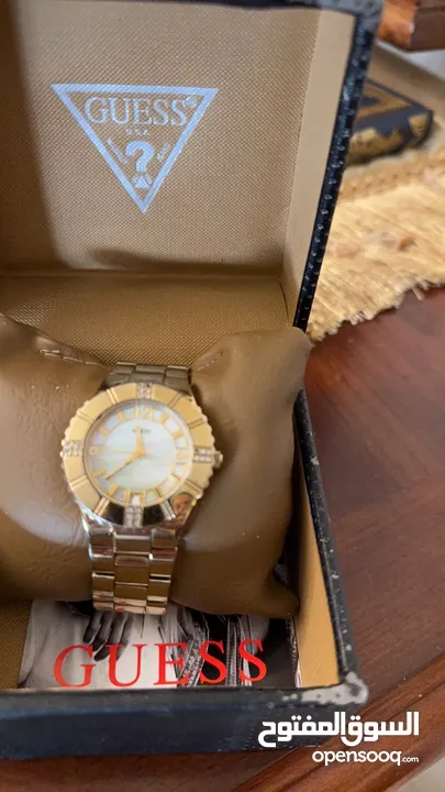 ساعه DKNY معدني برونز بحاله الجديده للبيع
