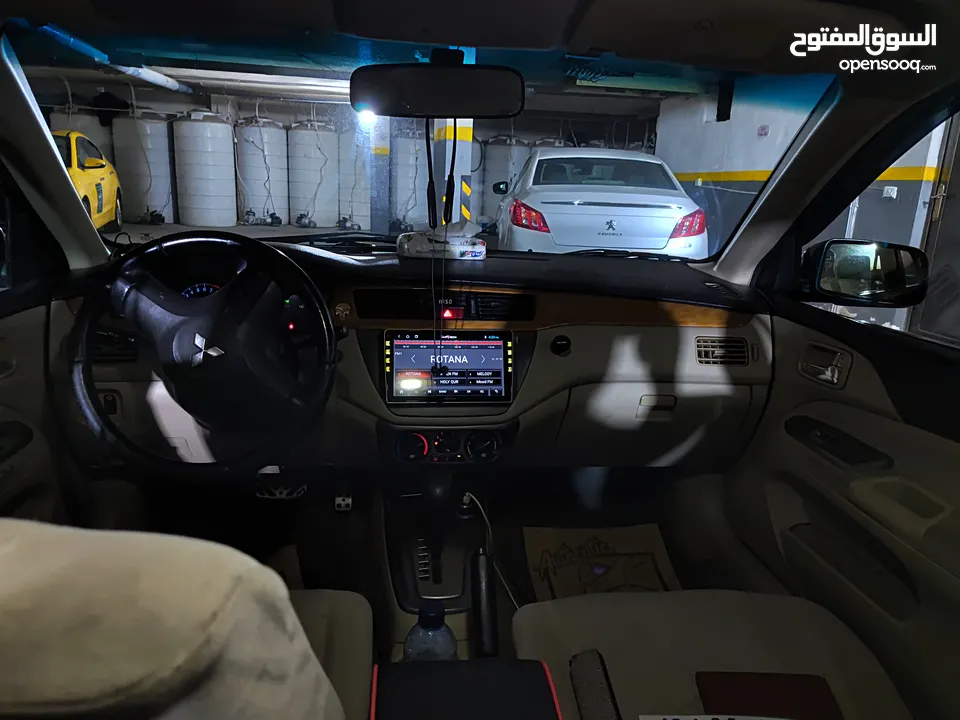متسوبيشي لانسر GLX 2007 1600 cc وارد الخليج الكويت جميع الإضافات بإستثناء الفتحه وجنط إضافي.