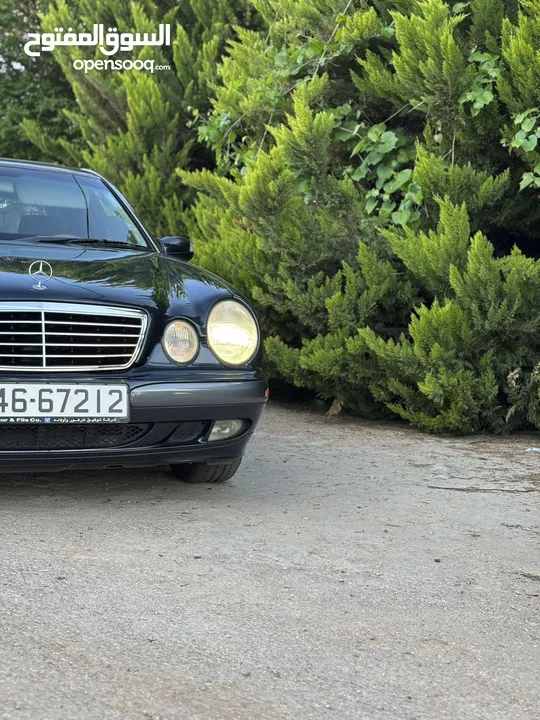 E200. 2002  قرش ونص 2002  رقم الهاتف بالوصف