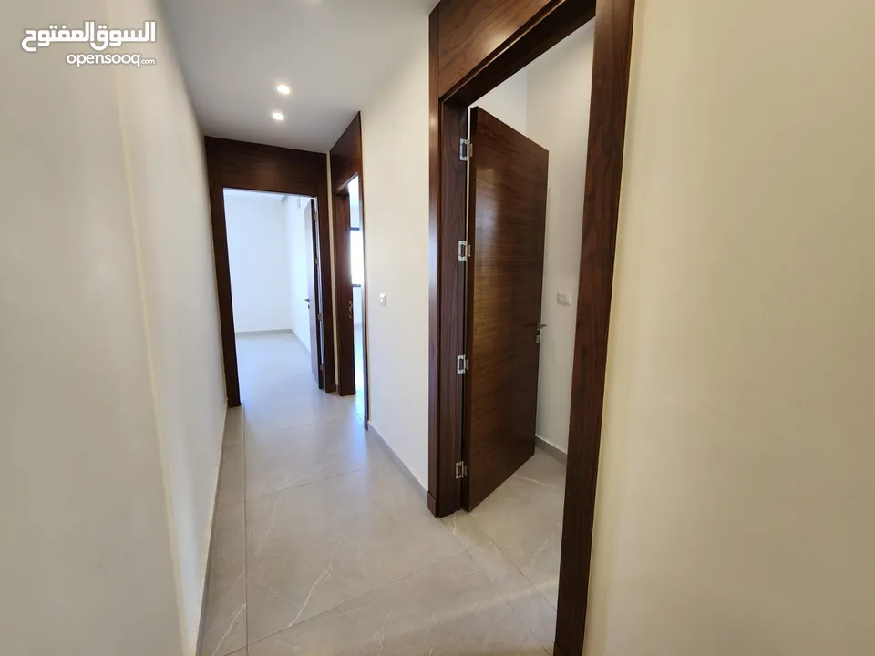 شقة طابقية فاخرة للبيع في عبدون ref : 14384