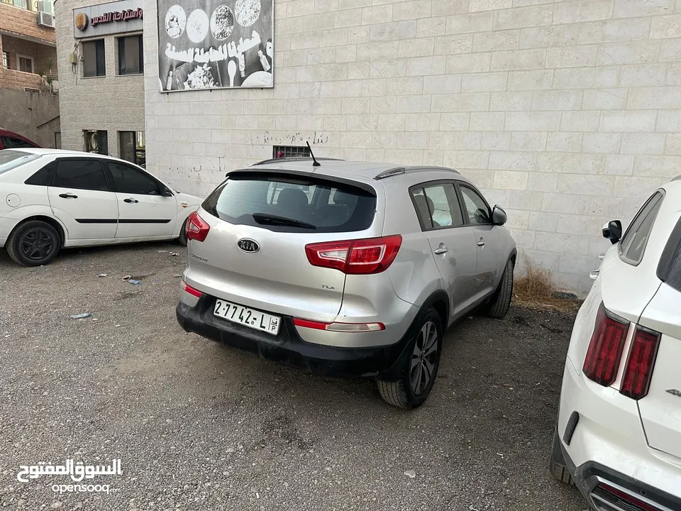 كيا سبورتاج2011 ديزل دفع رباعي ترخيص وتامين سنه فل اضافات بدون فتحه خاليه من الحوادث البيع كاش فقط