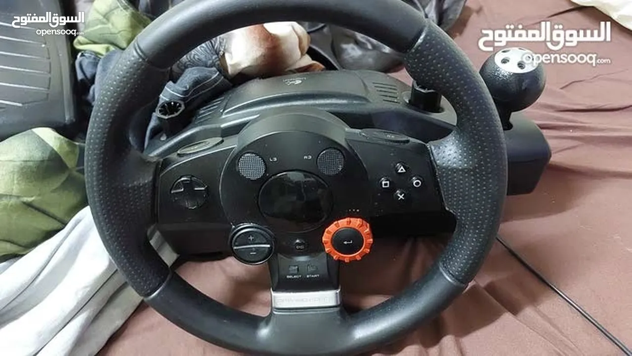 Playstation 3 super slim and steering gt drive force Logitech