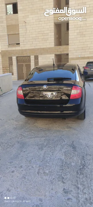 سكودا رابيد بحالة الوكالة ايد (0) ماتور 1400 بنزين تيربو احلا من الصور يطرح البركه لصاحب النصيب