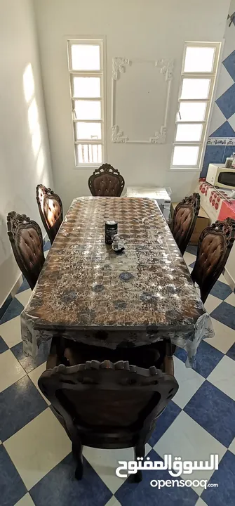طاولة طعام خشبية + 6 كراسي